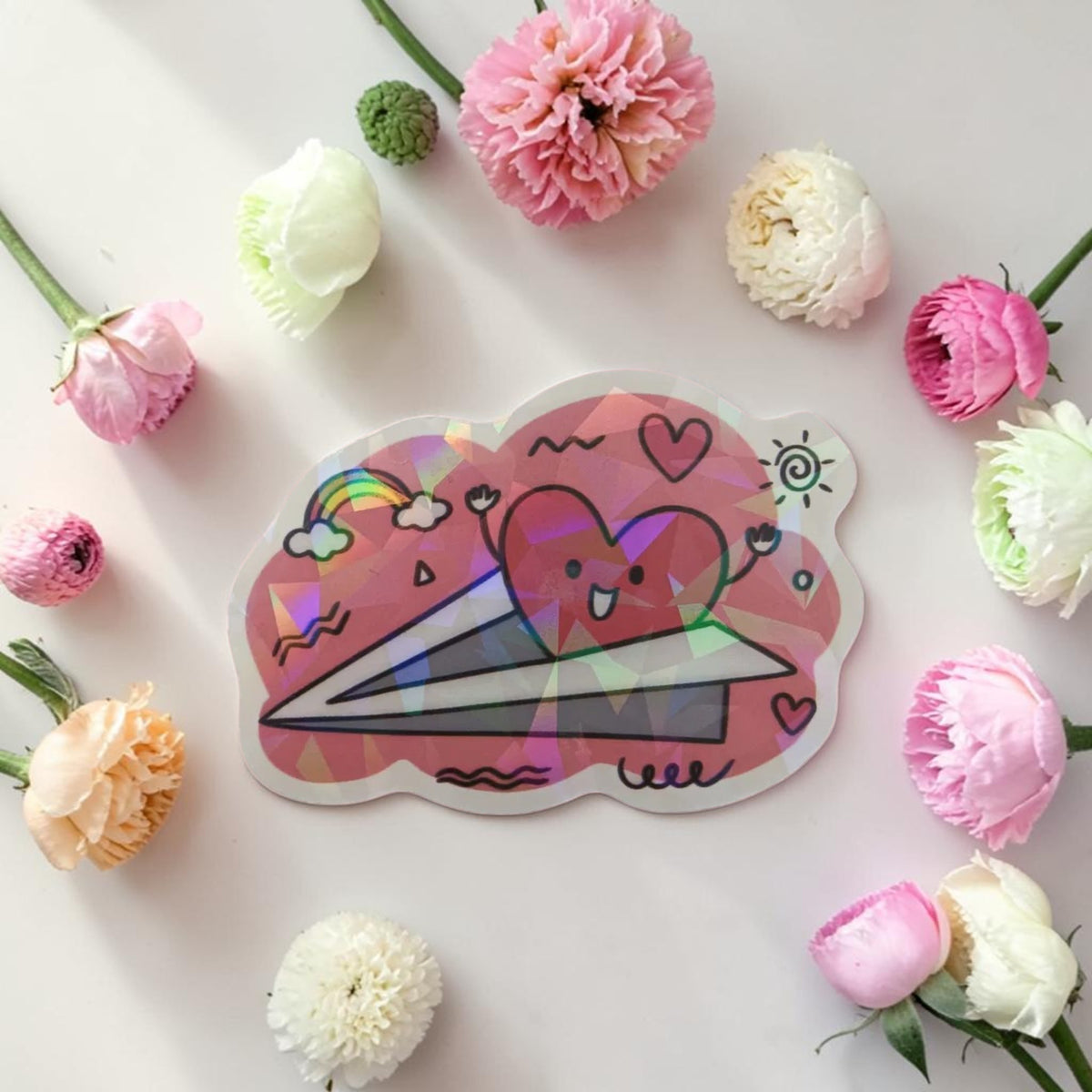 Sticker holographique — Love takes flight · À l'unité