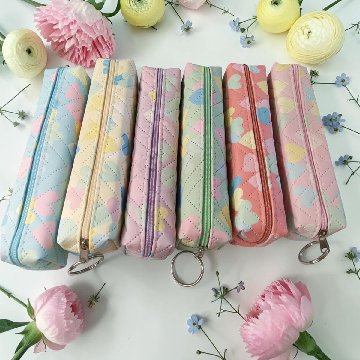 Trousse cœurs pastel