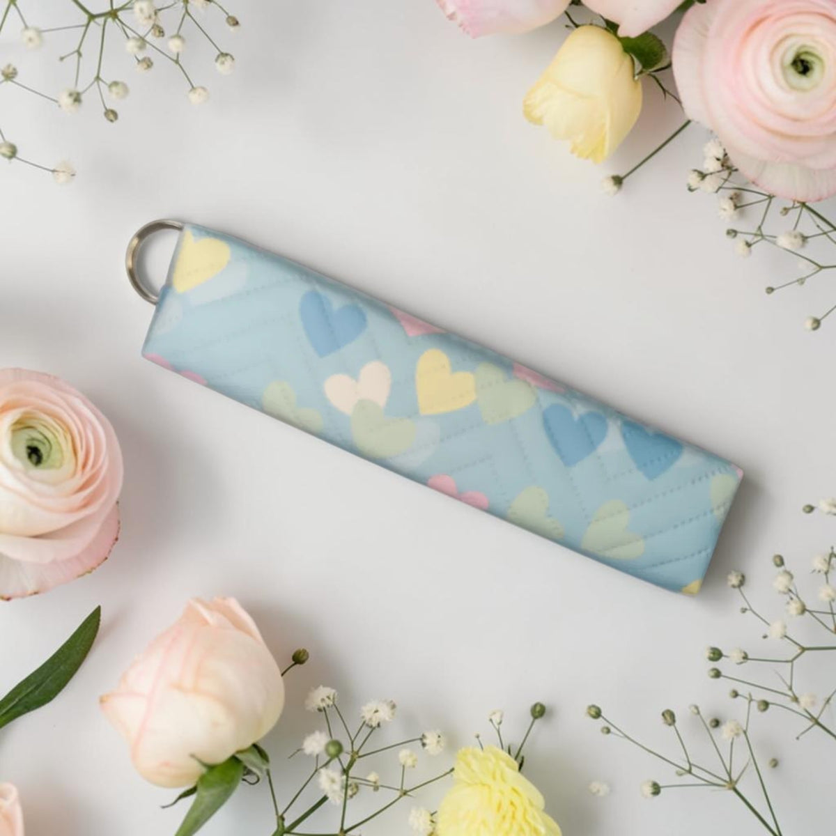 Trousse cœurs pastel
