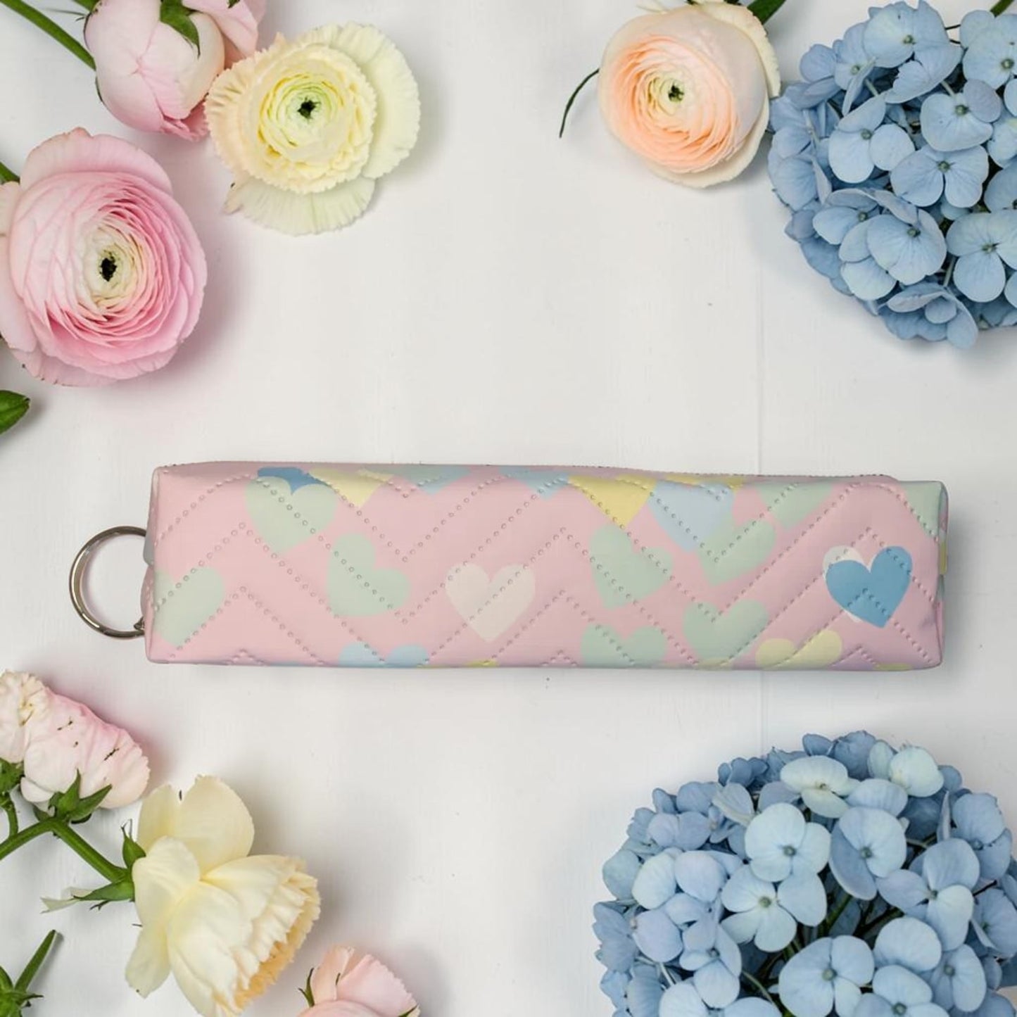 Trousse cœurs pastel