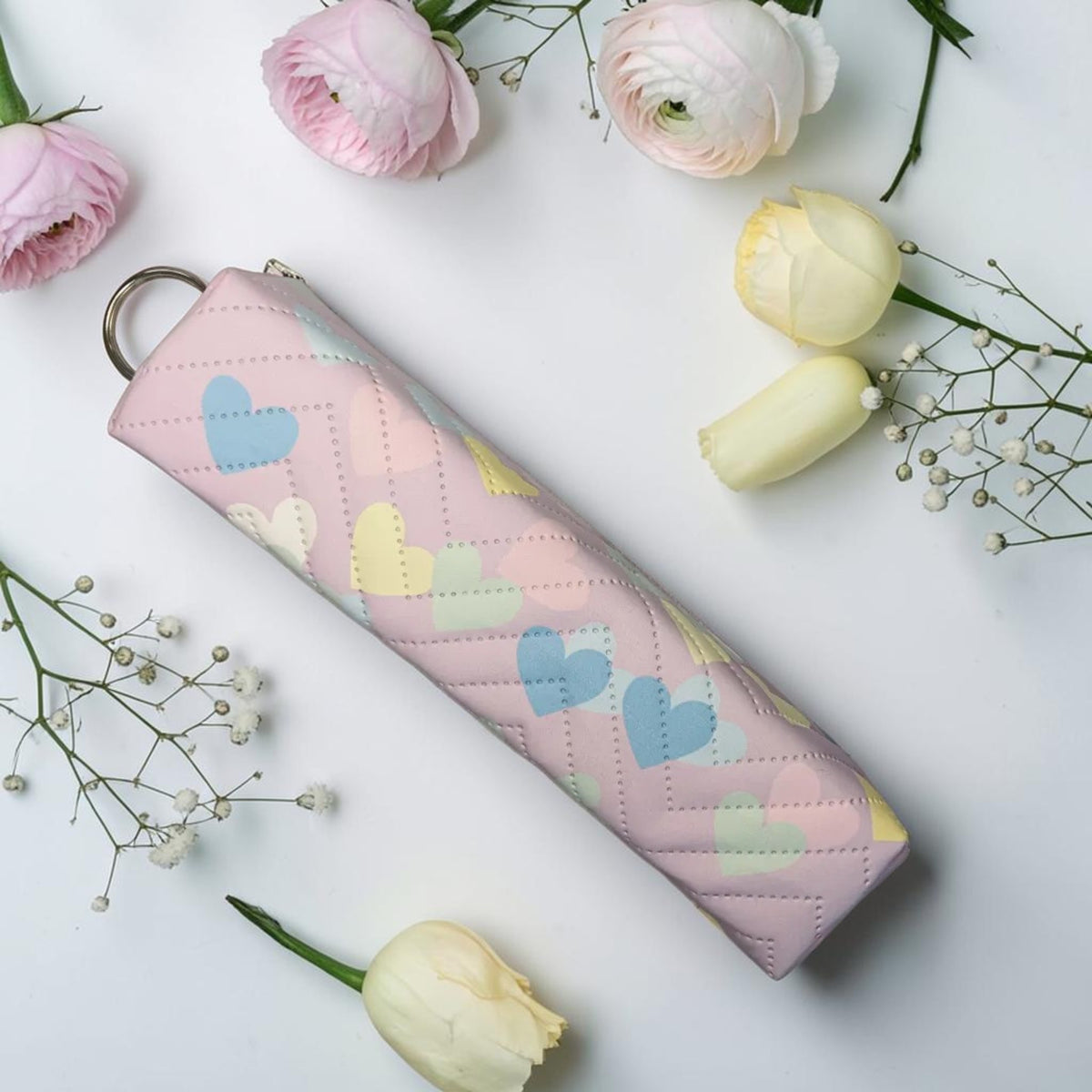 Trousse cœurs pastel